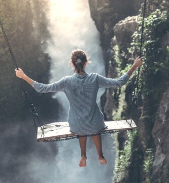 woman wearing grey long sleeved top photography